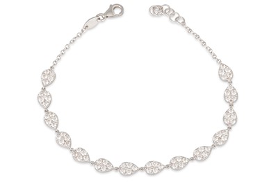 Lot 294 - A DIAMOND CLUSTER SET BRACELET, each pear...