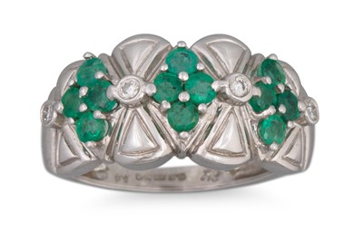 Lot 42 - AN EMERALD AND DIAMOND BAND RING, three...