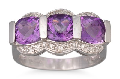 Lot 60 - AN AMETHYST AND DIAMOND CLUSTER RING, the...
