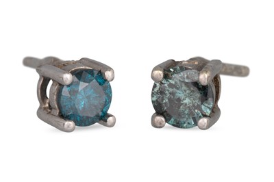 Lot 63 - A PAIR OF BLUE DIAMOND STUD EARRINGS, mounted...