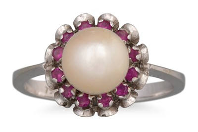 Lot 79 - A RUBY AND PEARL CLUSTER RING, stamped inside...