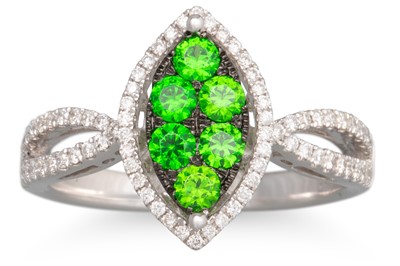 Lot 192 - A TSAVORITE GARNET AND DIAMOND CLUSTER RING,...