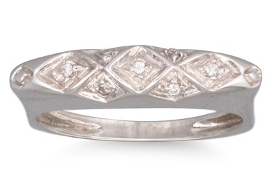 Lot 195 - A DIAMOND SET RING, shaped form in 18ct white...
