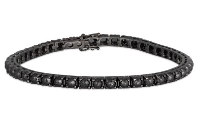 Lot 228 - A BLACK DIAMOND LINE BRACELET, in 18ct gold...