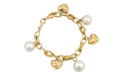 Lot 243 - A 14CT GOLD CHARM BRACELET, suspending heart...