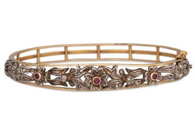 Lot 185 - AN ANTIQUE RUBY AND ROSE CUT DIAMOND BANGLE,...