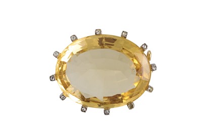 Lot 437 - A VINTAGE CITRINE AND DIAMOND BROOCH, the oval...