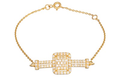 Lot 279 - A DIAMOND BRACELET, set to centre with pave...