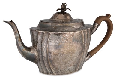 Lot 417 - A GEORGE III SILVER TEA POT, chased and...