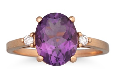Lot 97 - AN AMETHYST AND DIAMOND RING, the oval...