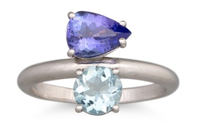 Lot 98 - A TANZANITE AND AQUAMARINE TWO STONE RING, the...