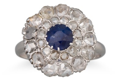 Lot 100 - A SAPPHIRE AND DIAMOND CLUSTER RING, circular...