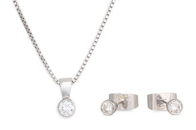 Lot 273 - A DIAMOND SET PENDANT, on a 9ct white gold...