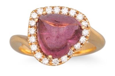 Lot 109 - A CABOCHON TOURMALINE AND DIAMOND CLUSTER RING,...