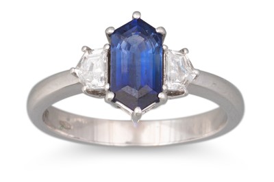Lot 110 - A SAPPHIRE AND DIAMOND THREE STONE RING, the...