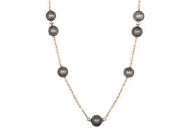 Lot 130 - A LONG TAHITIAN PEARL AND DIAMOND NECKLACE,...