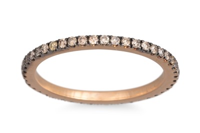 Lot 132 - A GREY DIAMOND ETERNITY RING, mounted in 18ct...