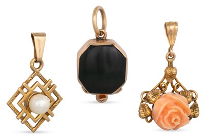 Lot 240 - A 14CT YELLOW GOLD CARVED PENDANT, together...