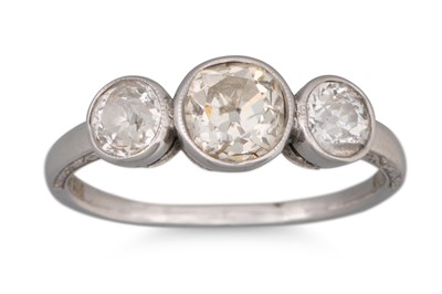 Lot 244 - A VINTAGE DIAMOND THREE STONE RING, the bezel...