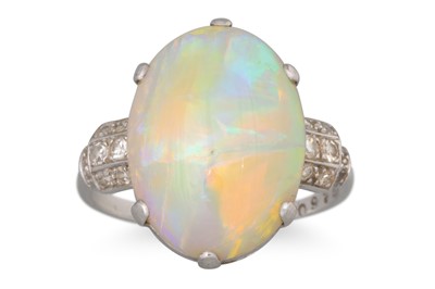 Lot 278 - AN OPAL RING, mounted in platinum, 17 x 12 mm,...