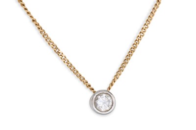 Lot 283 - A DIAMOND PENDANT,the bezel set diamond...
