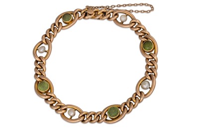 Lot 284 - A PERIDOT AND PEARL SET BRACELET, in 15ct gold,...