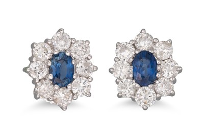 Lot 315 - A PAIR OF DIAMOND AND SAPPHIRE CLUSTER...