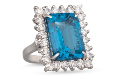 Lot 316 - A TOPAZ AND DIAMOND CLUSTER RING, the...