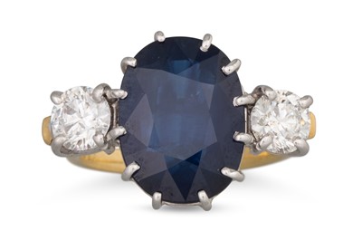 Lot 317 - A SAPPHIRE AND DIAMOND THREE STONE RING, the...