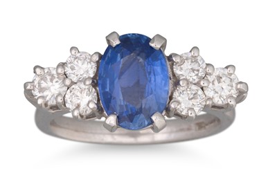 Lot 397 - A SAPPHIRE AND DIAMOND RING, the oval sapphire...