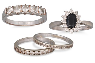Lot 341 - THREE 9CT GOLD RINGS, together with another ring