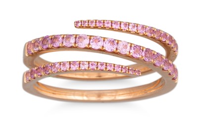 Lot 62 - A PINK SAPPHIRE RING, split cross over style,...