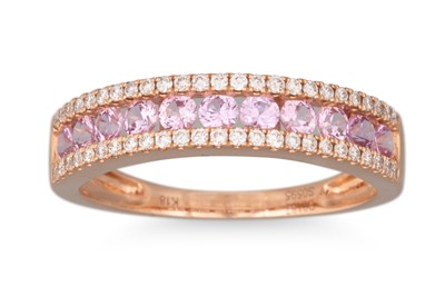 Lot 64 - A DIAMOND AND PINK SAPPHIRE THREE ROWED RING,...