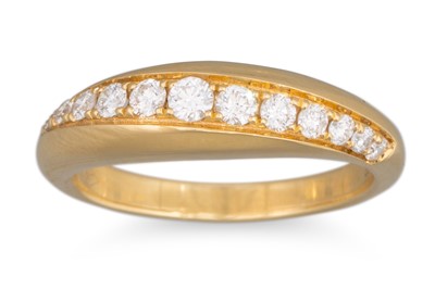 Lot 67 - A PAVÉ DIAMOND SET RING, in domed 18ct yellow...