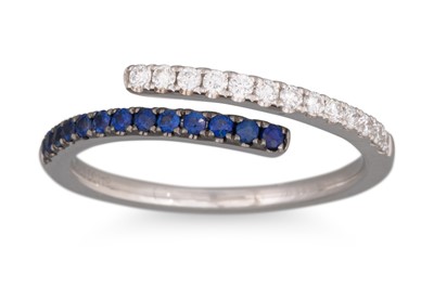 Lot 68 - A DIAMOND AND SAPPHIRE CROSS OVER SPLIT BAND...