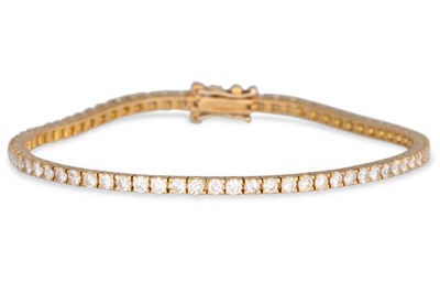 Lot 139 - A DIAMOND LINE BRACELET, the brilliant cut...