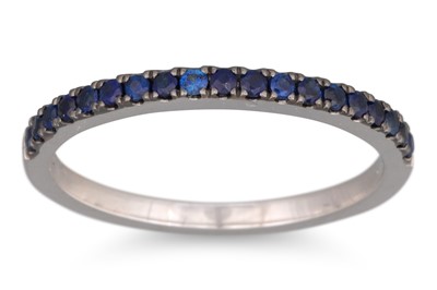 Lot 140 - A SAPPHIRE HALF ETERNITY RING, the circular...