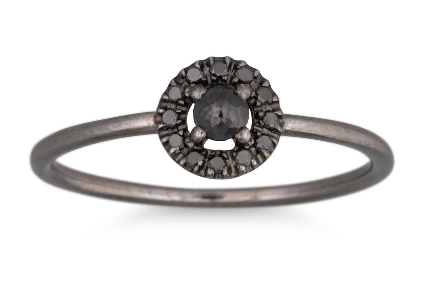 Lot 195 - A BLACK DIAMOND CLUSTER RING, mounted in black...
