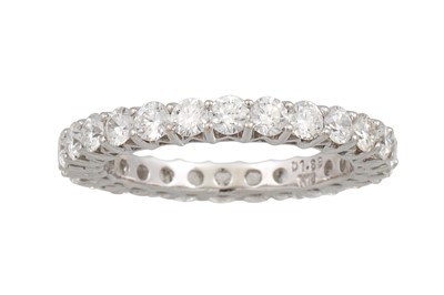 Lot 412 - A DIAMOND FULL BANDED ETERNITY RING, mounted...