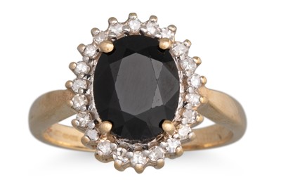 Lot 16 - A SAPPHIRE AND DIAMOND CLUSTER RING, the oval...