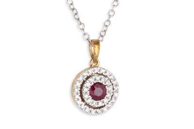 Lot 76 - A DIAMOND AND RUBY PENDANT, the central ruby...