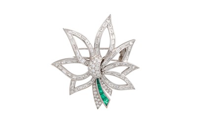 Lot 250 - A DIAMOND AND EMERALD BROOCH OF FLOWER FORM,...