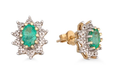 Lot 81 - A PAIR OF EMERALD AND DIAMOND CLUSTER EARRINGS,...