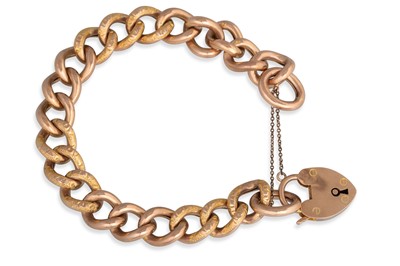 Lot 95 - AN ANTIQUE 9CT GOLD CURB BRACELET, with...