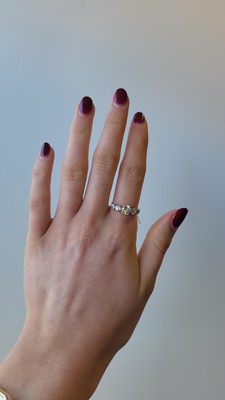 Lot 98 - AN ANTIQUE DIAMOND FIVE STONE RING, the...