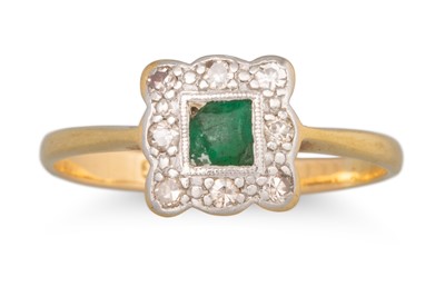 Lot 34 - AN EMERALD AND DIAMOND CLUSTER RING, mounted...