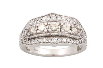 Lot 252 - A DIAMOND DRESS RING, set with three rows of...