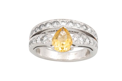 Lot 257 - A SAPPHIRE AND DIAMOND RING, the pear shaped...