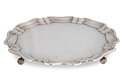 Lot 198 - A MID 20TH CENTURY SHAPED CIRCULAR SALVER,...