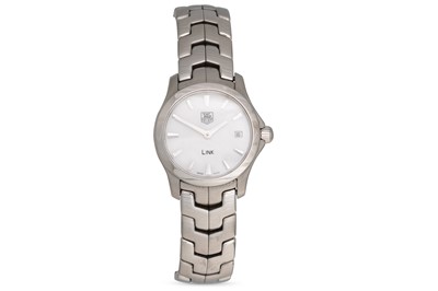 Lot 428 - A LADY'S TAG HEUER WRISTWATCH, white dial,...